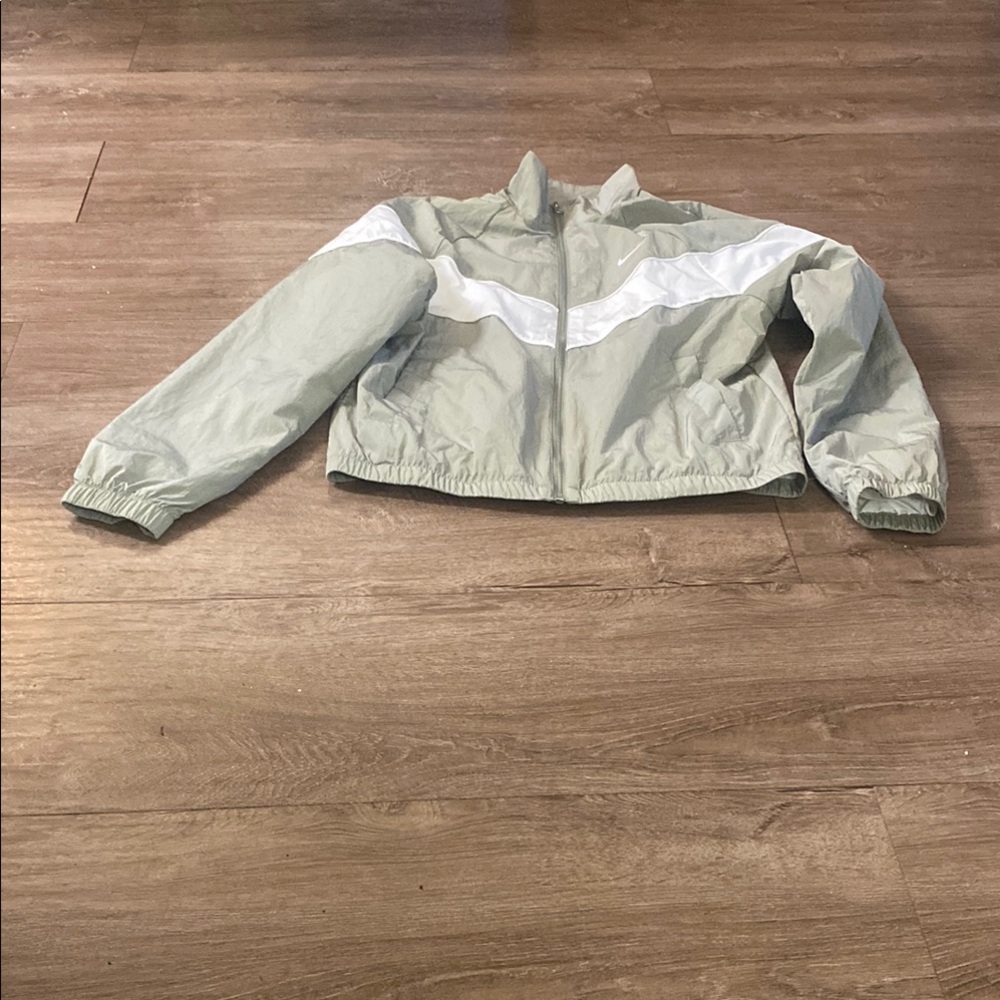 SOLD…NWT..Windbreaker Jacket with White Stripe. Khaki color and white